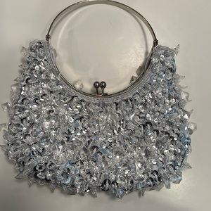 Super sparkly silver clutch with gems and lots of bling!